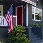 home in Indianapolis with new siding and an American flag
