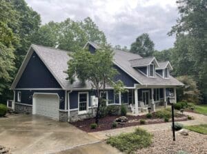 Dark blue james hardie siding installed after learning why you need you siding replaced in Indianapolis, Indiana