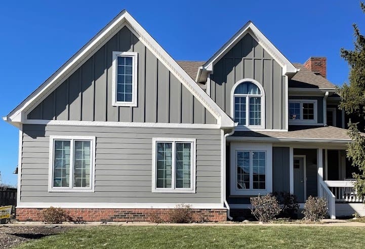 Gray vertical panel siding by James Hardie