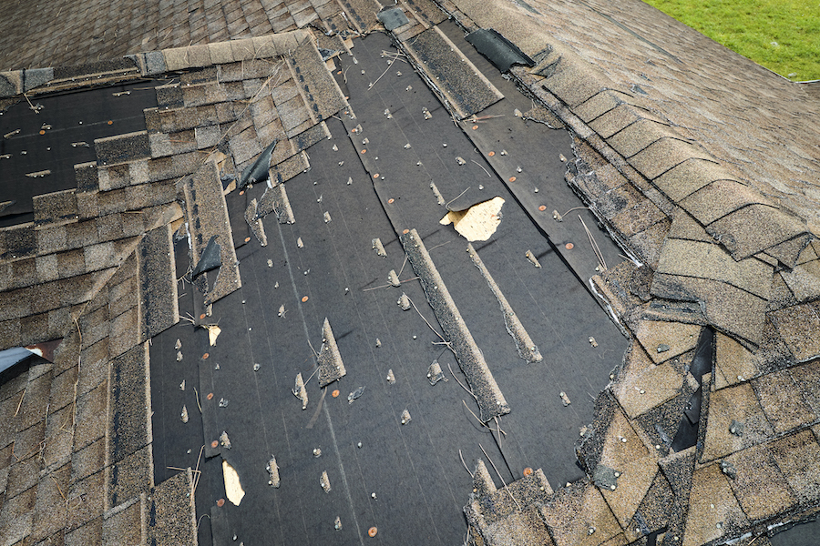 Missing shingles from roof damage 