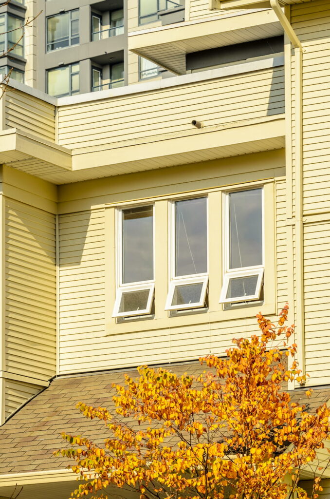 Windows in a Yellow Building on a Sunny Day