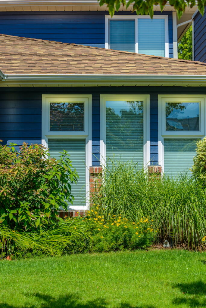 Fragment Of A Very Neat And Colorful Home With Gorgeous Outdoor Landscape In Suburbs