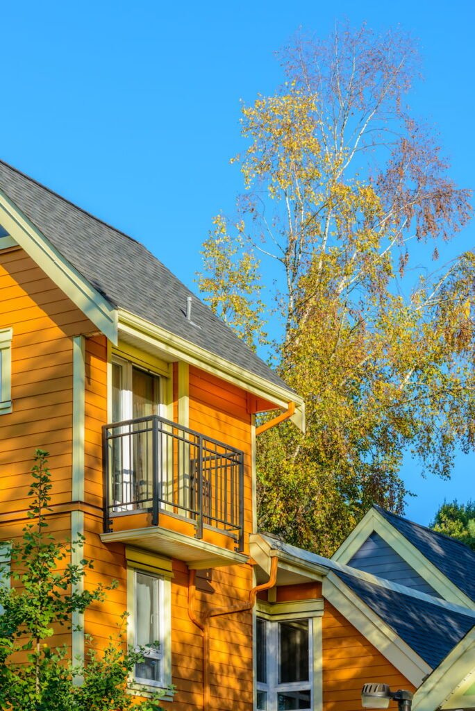A Perfect Neighborhood. Houses In Suburb At Summer In The North America. Fragment Of A Luxury House